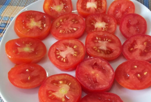 A La Caprese Appetizer of Tomatoes and Cheese step 1