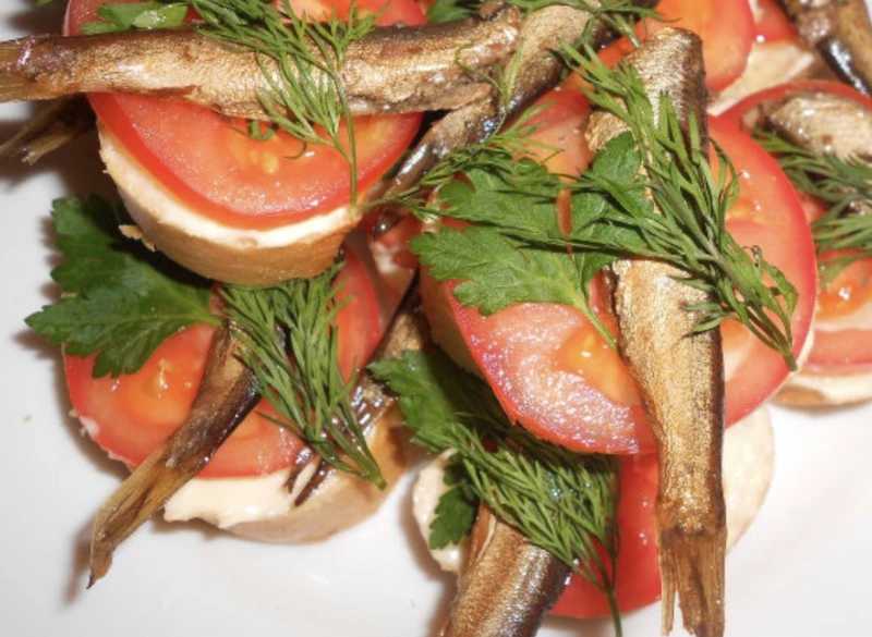 Canapes with sprats are ready