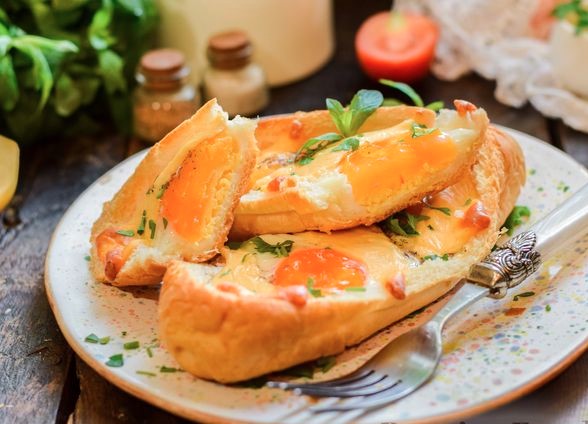 Scrambled Eggs with Cheese in the “Boat”
