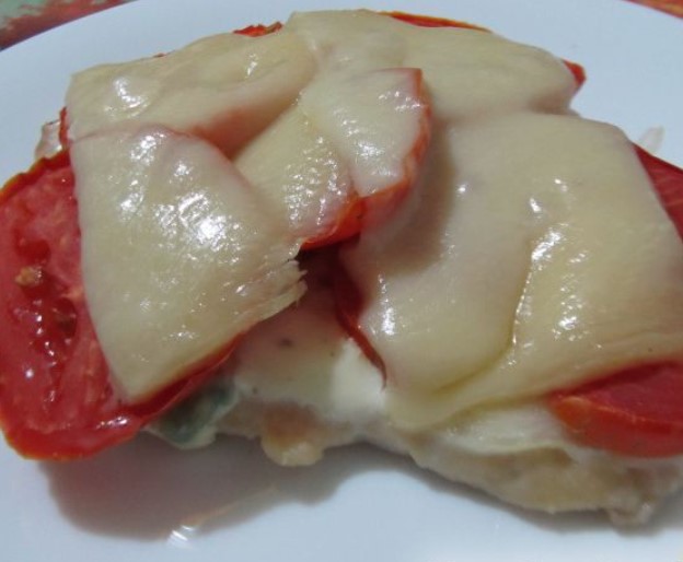 Chicken Chops Baked With Tomatoes and Cheese