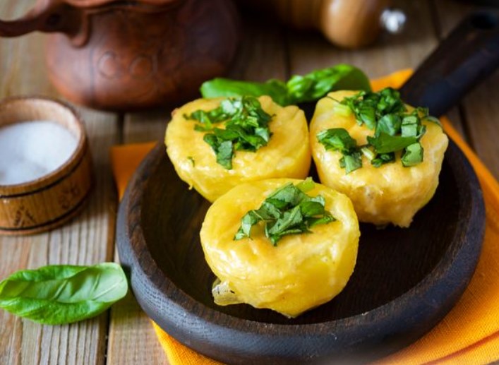 Young Potatoes Baked with Quail Eggs and Cheese