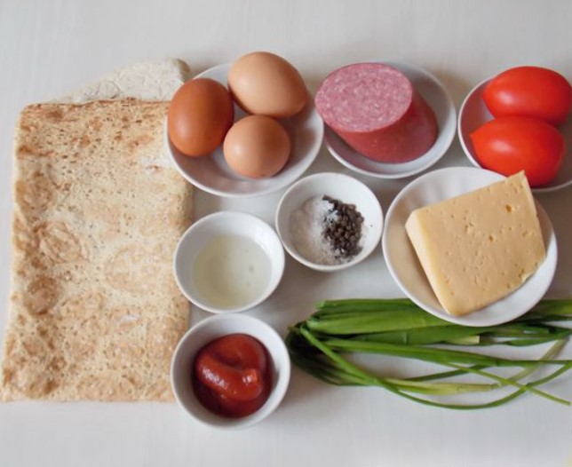 Fried Eggs in Pita Bread with Sausage, Tomato and Cheese step 1