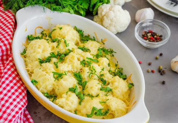 Cauliflower Baked in Sour Cream-Garlic Sauce with Cheese