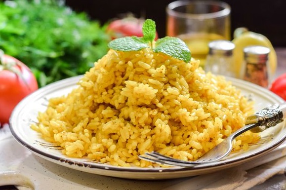 Rice Porridge on Water, with Turmeric, Curry and Dried Herbs