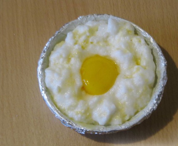 Put the protein and cheese into the prepared dish