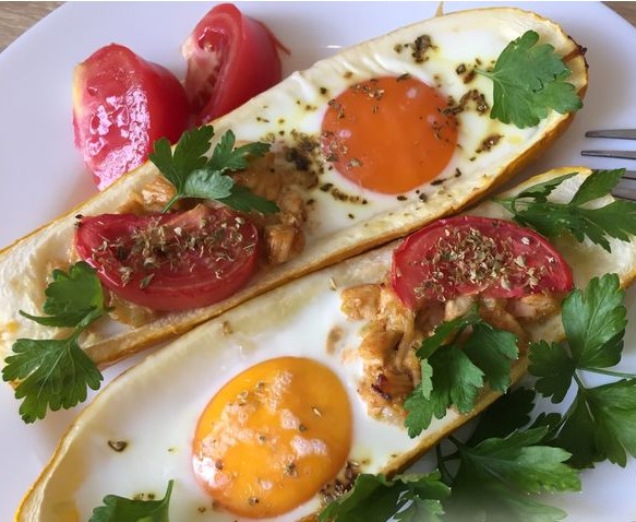 Fried Eggs in Zucchini with Chicken and Tomato