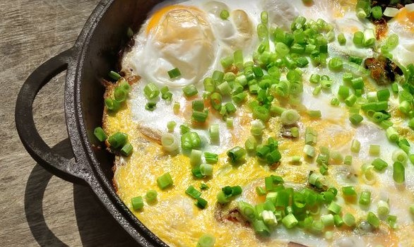 Fried Eggs with Bacon and Onions on a Finnish Candle