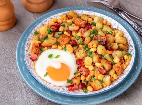 Fried Eggs with Potatoes, Ham, and Corn