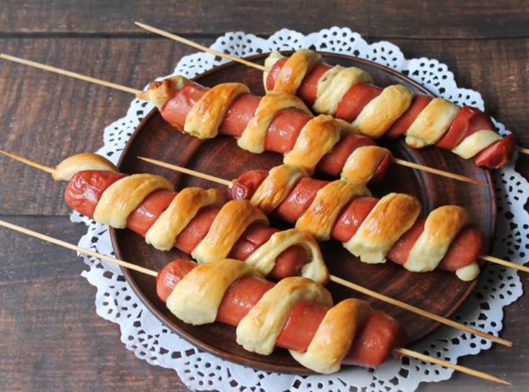 Spiral Sausages in Yeast Dough, on Skewersh, on Skewers