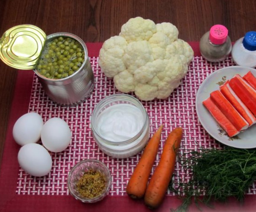 Salad with Cauliflower, Crab Sticks, Carrots and Peas step 1