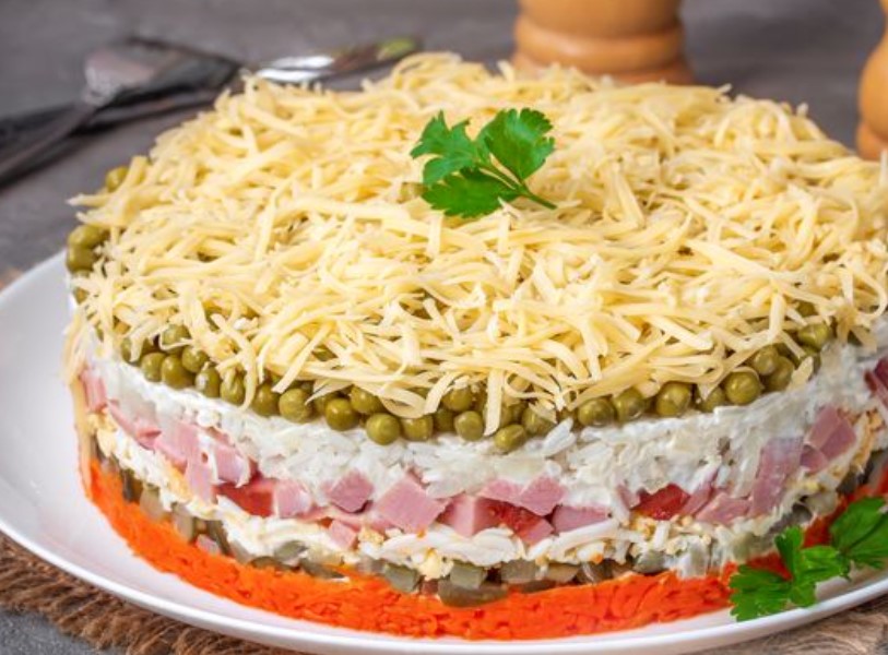 Puff Salad with Ham, Carrots, Rice and Pickled Cucumbers