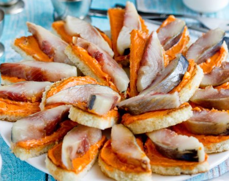 Canape with Herring and Tomato Oil