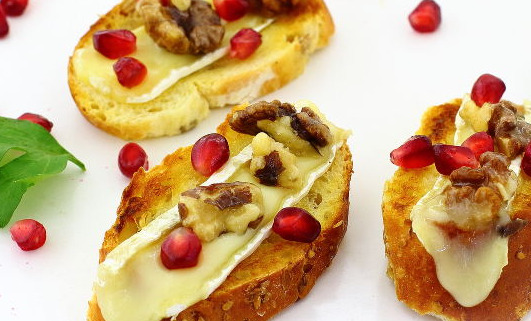 Crostini with Brie Cheese, Pomegranate and Walnuts