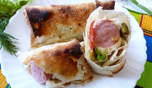 Sausages in Pita Bread with Pickled Cucumbers and Cheese