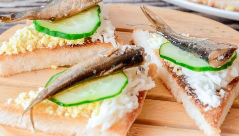 Garlic Croutons with Sprats, Eggs and Cucumber