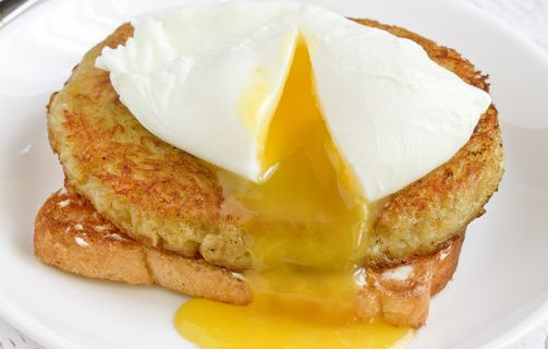 Toast with Melted Cheese, Potato Pancakes and Poached Egg