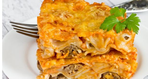 Dumplings Baked in Sour Cream and Tomato Sauce