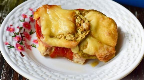 Eggplant Baked with Chicken Fillet, Tomatoes and Cheese