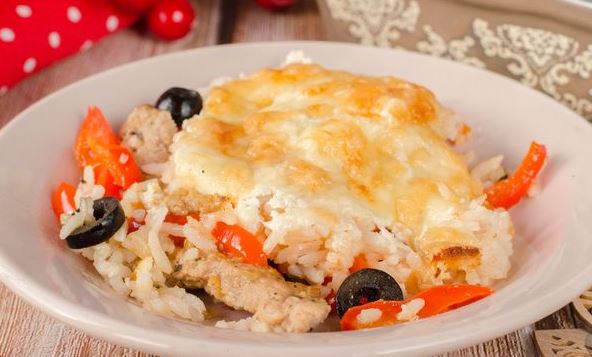 Meat Baked with Rice, Vegetables and Olives