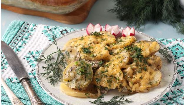 Meat Baked with Zucchini and Potatoes, Sour Cream and Cheese