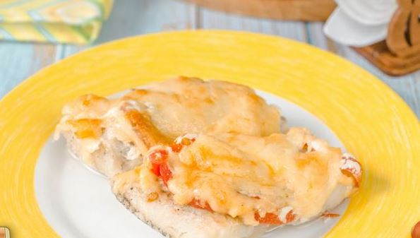Pollock Baked with Tomatoes and Cheese