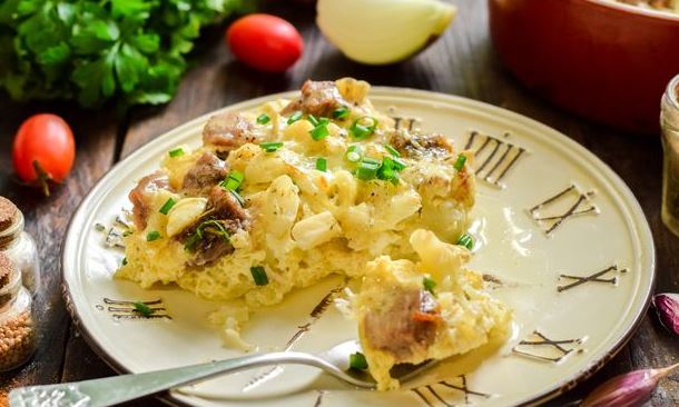 Pork Baked with Cauliflower and Cheese, in Egg and Milk Sauce