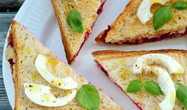 Sandwiches with Beets, Eggs, Pickled Cucumber and Olives