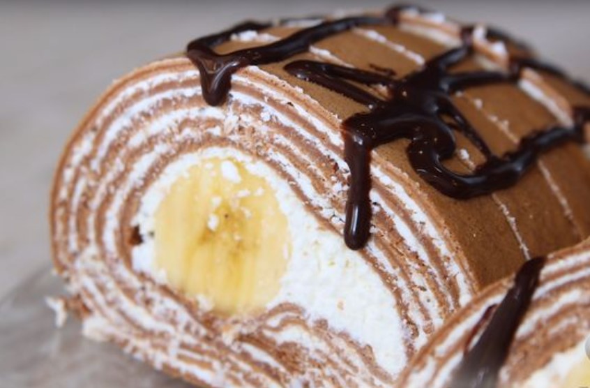 Roll of Chocolate Pancakes with Cottage Cheese and Banana