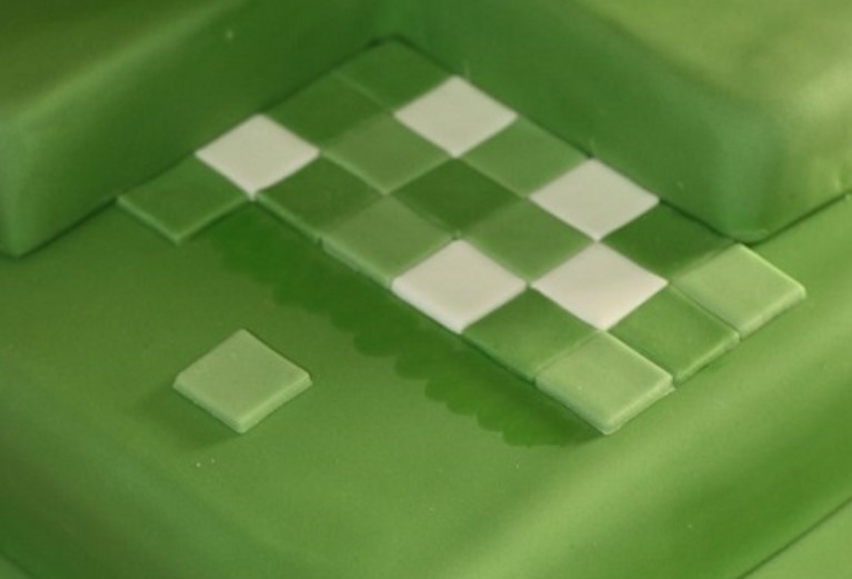 Glue the parts by dampening the brush in water