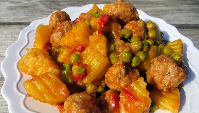 Meatballs Stewed with Potatoes and Peas