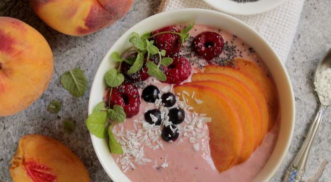 Peach Smoothie Bowl with Raspberries and Currants
