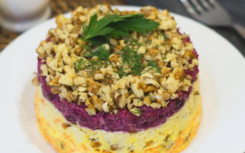 Puff Salad with Beets, Carrots, Cheese, Dried Fruits and Nuts