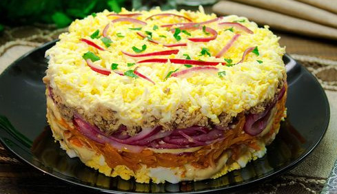 Puff Salad with Sardines, Carrots, Eggs and Onions