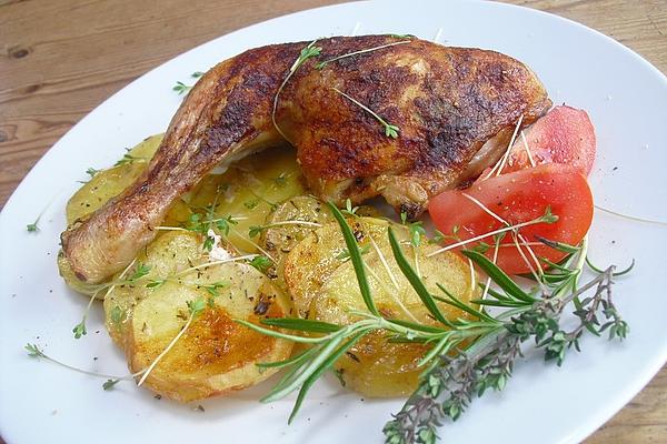 Baked Chicken Legs on Potatoes