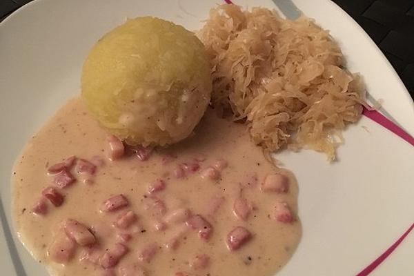Filled Dumplings with Sauerkraut and Creamy Bacon Sauce