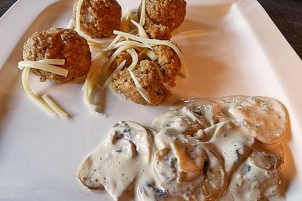 Green Spelled Dumplings with Mushroom Cream Sauce