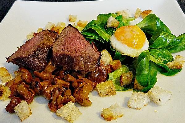 Lamb`s Lettuce with Venison Steak, Chanterelles and Quail Eggs