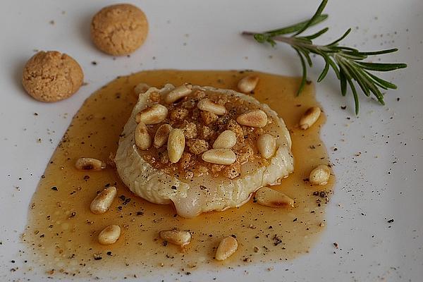 Lukewarm Gratinated Goat Cheese with Garlic and Rosemary – Honey Syrup