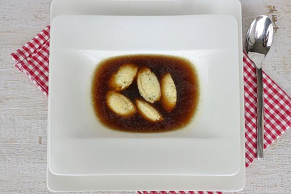 Porcini Mushroom Essence with Semolina Parmesan Curls
