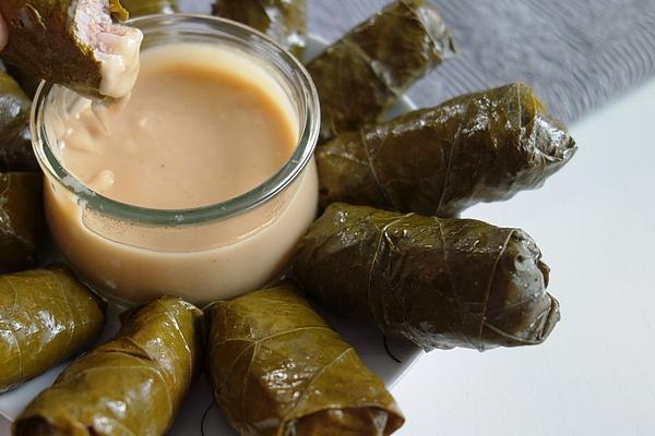 Stuffed Grape Leaves with Egg and Lemon Sauce