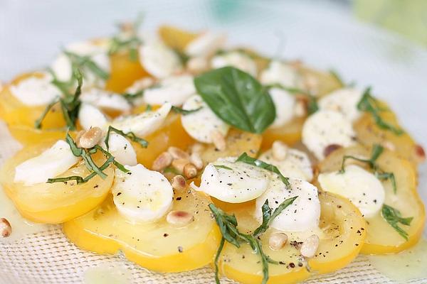 Tomato and Mozzarella Carpaccio with Pine Nuts