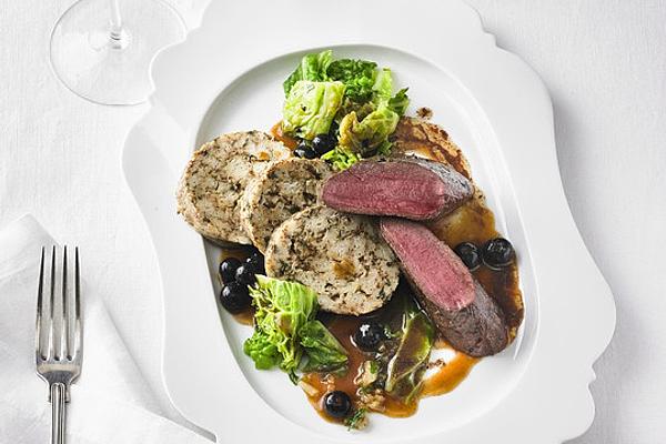 Venison Fillet in Vanilla Flower and Blueberry Sauce with Chanterelle Dumplings