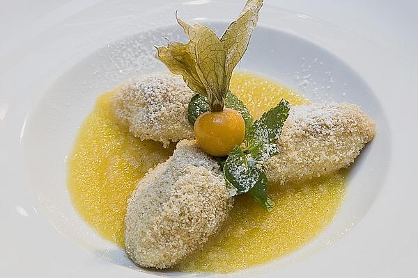 Warm Vanilla Curd Cheese Dumplings on Mango Sauce