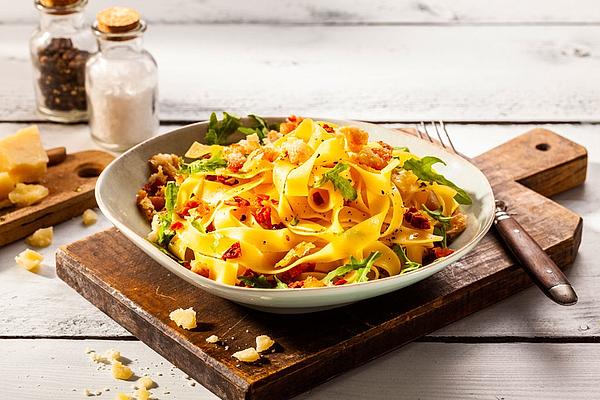 Arugula Ribbon Noodles with Chicken Parmesan Croutons
