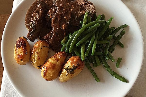 Braised Leg Of Lamb in Red Wine, Peppered with Mint and Rosemary