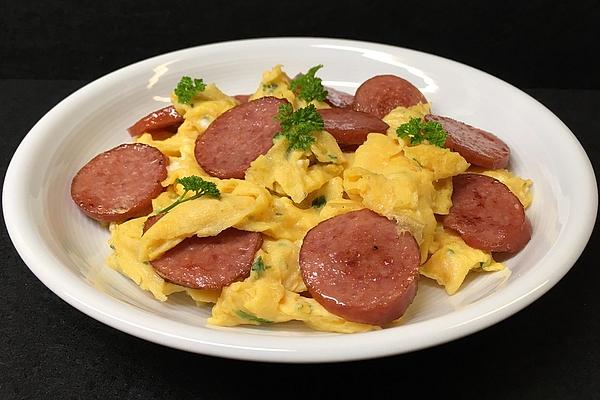 Cabanossi on Scrambled Eggs with Herbs
