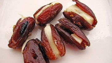 Filled Goat Cheese in Pancetta Coating on Salad