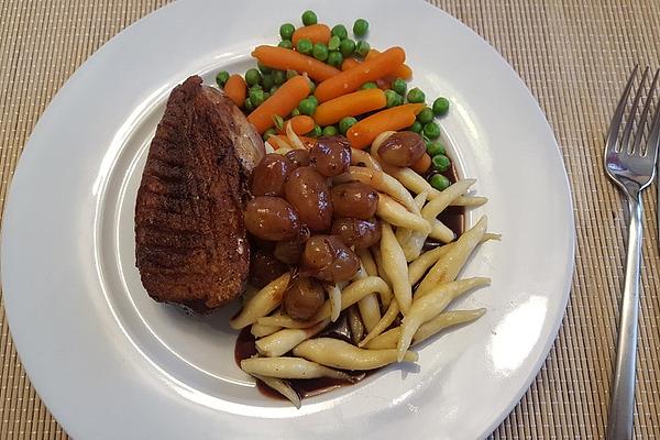 Duck Breast on Potato Noodles with Grape and Cassis Sauce