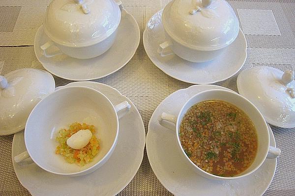 Guinea Fowl Consommé with Poached Quail Egg and Vegetable Brunoise
