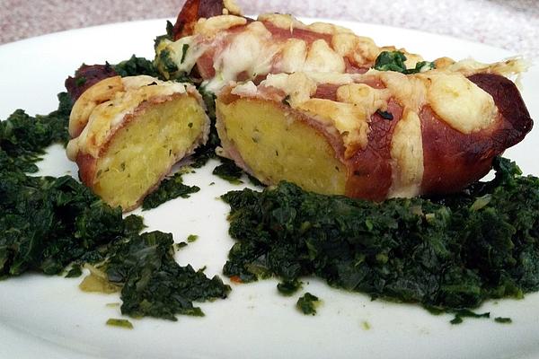 Ham Rolls on Spinach Leaves